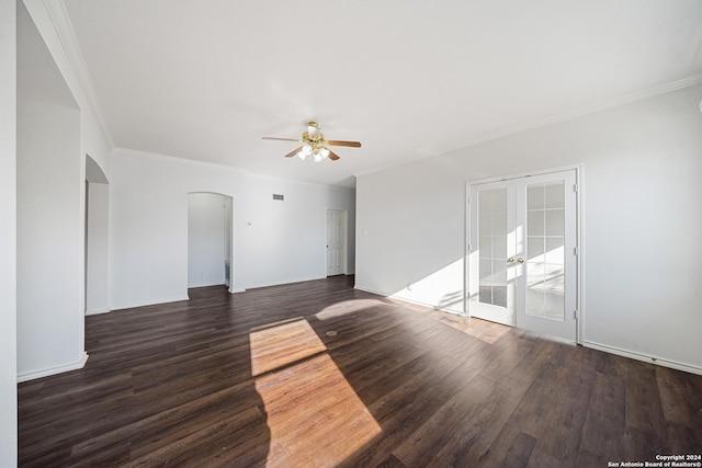 spare room with french doors, dark hardwood / wood-style floors, ceiling fan, and crown molding