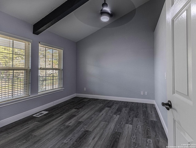 empty room with vaulted ceiling with beams, ceiling fan, and dark wood-type flooring