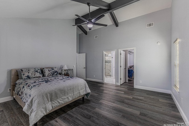 bedroom featuring a spacious closet, dark hardwood / wood-style floors, high vaulted ceiling, and ceiling fan