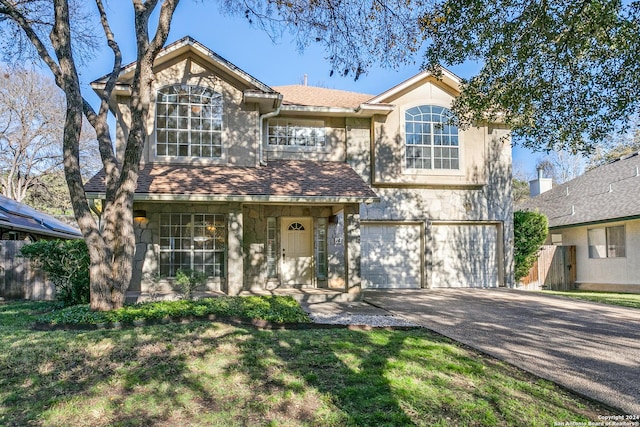 front of property featuring a garage