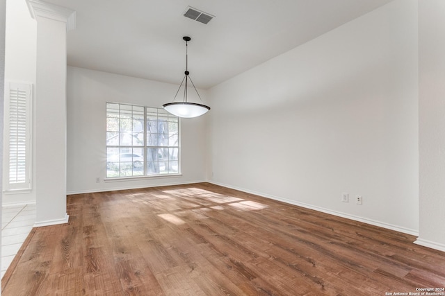 unfurnished dining area with hardwood / wood-style flooring