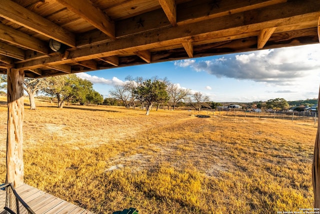 view of yard with a rural view