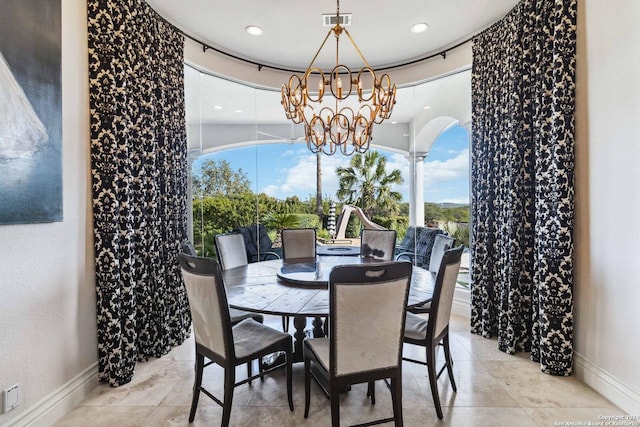 dining space with baseboards, recessed lighting, visible vents, and an inviting chandelier