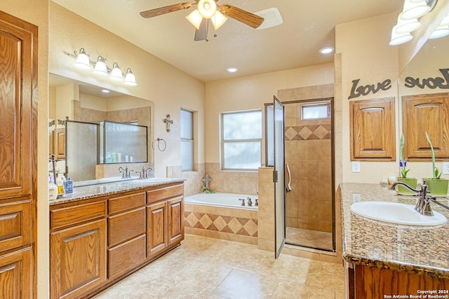 bathroom with ceiling fan, vanity, shower with separate bathtub, and tile patterned floors