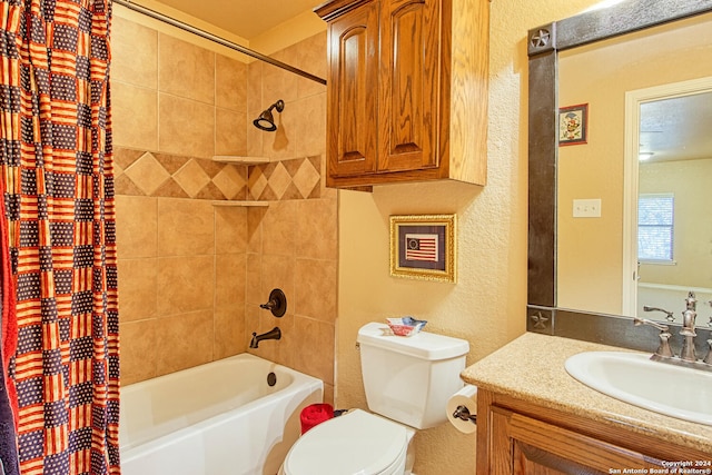 full bathroom featuring vanity, shower / bath combo, and toilet