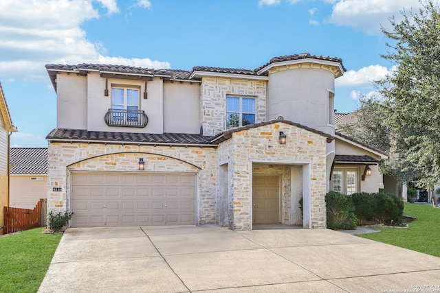 mediterranean / spanish-style house featuring a garage