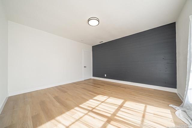 empty room with light wood-type flooring