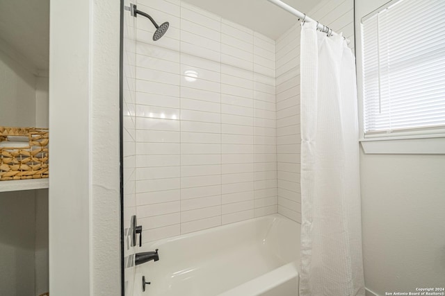 bathroom with shower / tub combo