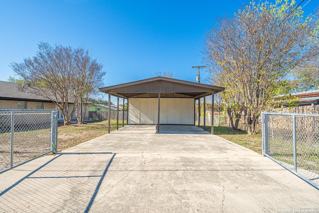 exterior space featuring a carport and a lawn