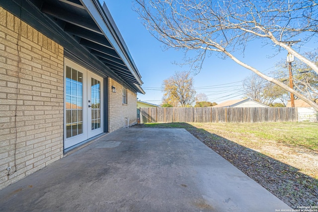 view of patio featuring french doors