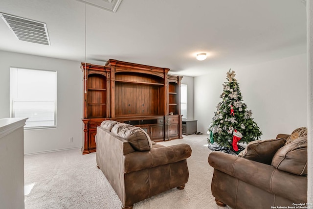 living room featuring light colored carpet