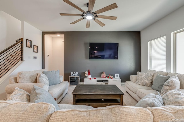 living room featuring ceiling fan