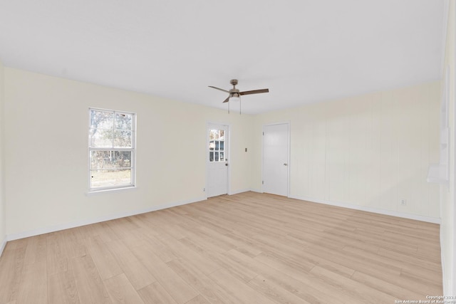 unfurnished room featuring ceiling fan and light wood-type flooring