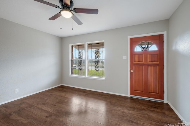 foyer entrance featuring ceiling fan and dark hardwood / wood-style floors