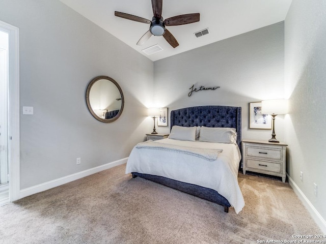 carpeted bedroom featuring ceiling fan and lofted ceiling