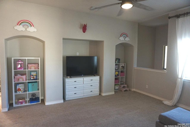 unfurnished bedroom with ceiling fan and light colored carpet