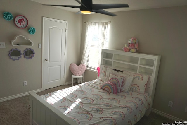 carpeted bedroom with ceiling fan