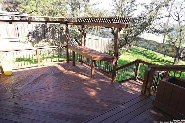 wooden deck with a yard