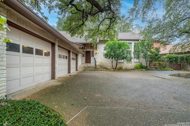 exterior space with a garage