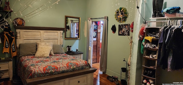 bedroom featuring wood-type flooring