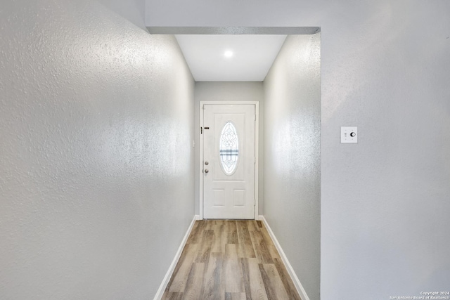 doorway to outside featuring light hardwood / wood-style floors