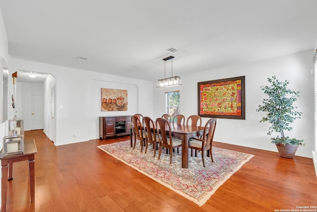 dining space featuring hardwood / wood-style floors