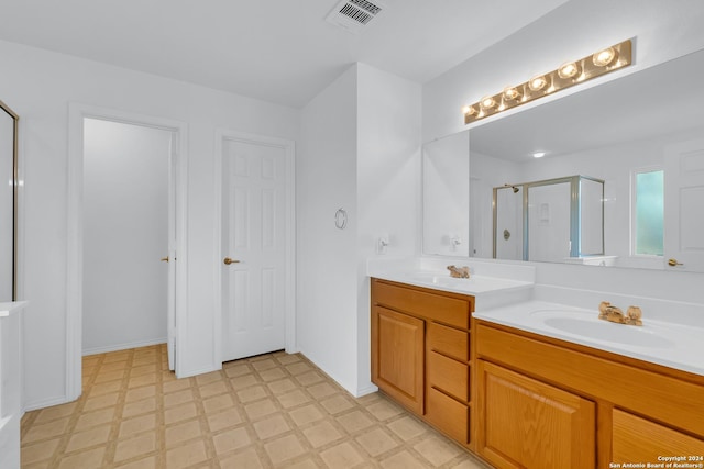 bathroom featuring vanity and walk in shower