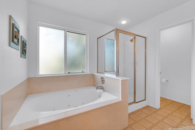 bathroom with independent shower and bath