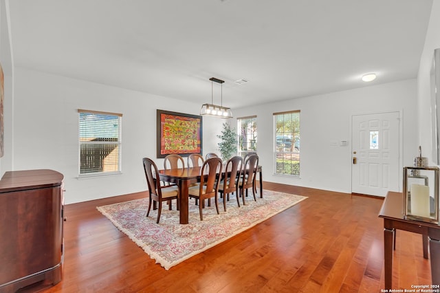 dining room featuring dark wood-type flooring