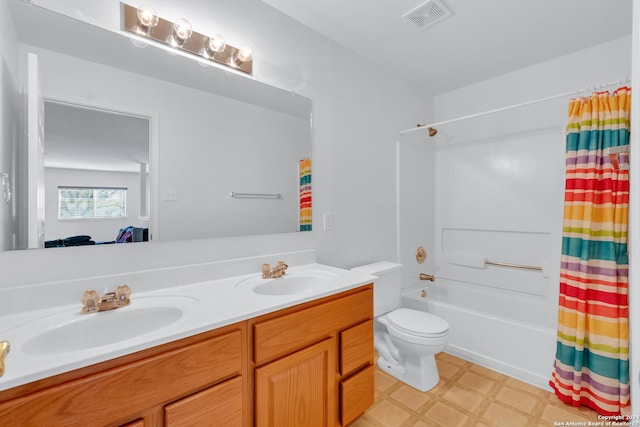 full bathroom featuring shower / tub combo with curtain, vanity, and toilet