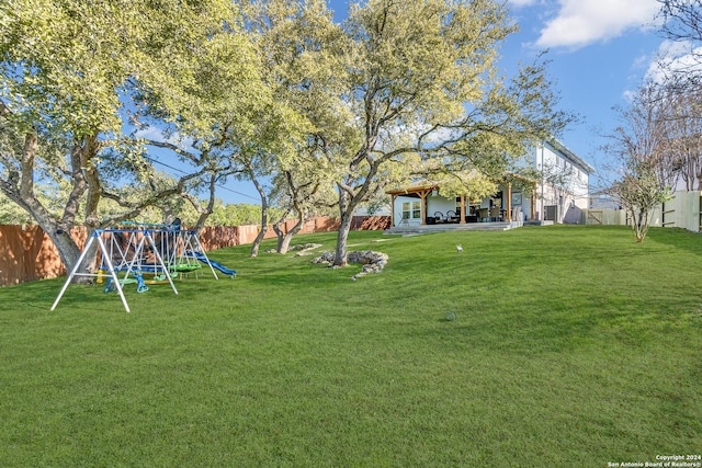 view of yard with a playground