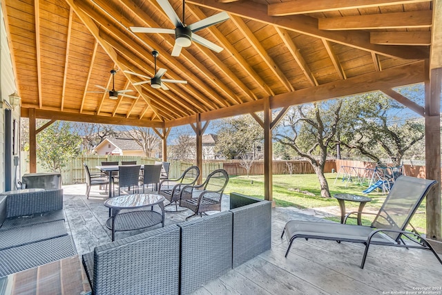 view of patio / terrace with an outdoor living space and ceiling fan