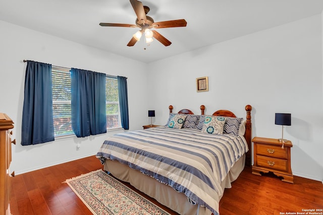 bedroom featuring wood-type flooring and ceiling fan