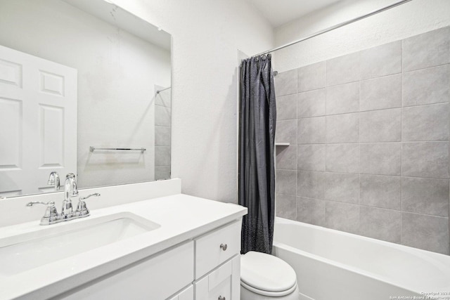 full bathroom featuring vanity, toilet, and shower / tub combo with curtain