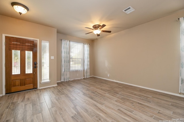 foyer entrance featuring light hardwood / wood-style floors, plenty of natural light, and ceiling fan