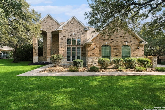 view of front of home with a front yard