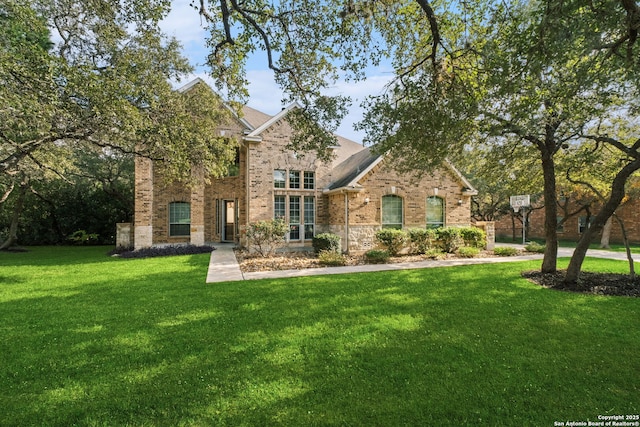 view of front of home with a front yard