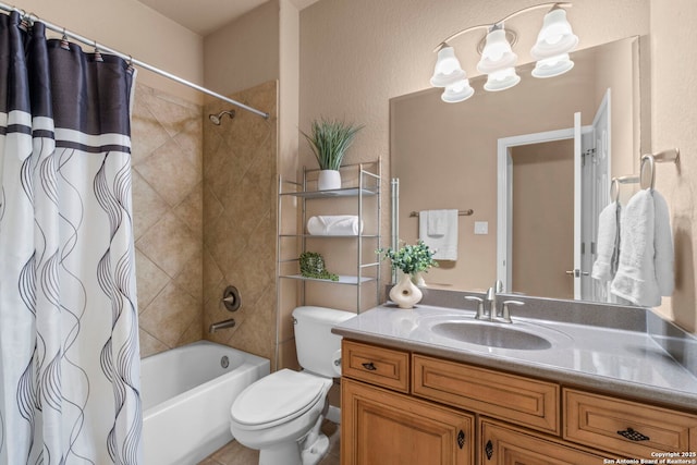 full bathroom with a chandelier, toilet, vanity, and shower / bath combo