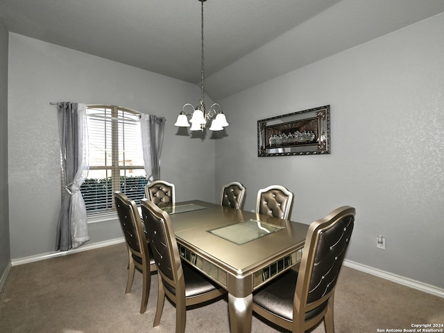 carpeted dining area with a notable chandelier