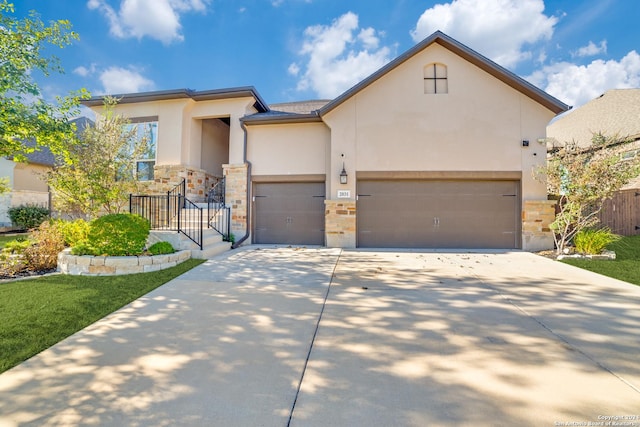 view of front of property with a garage