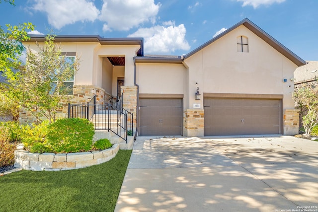 view of front of property featuring a garage