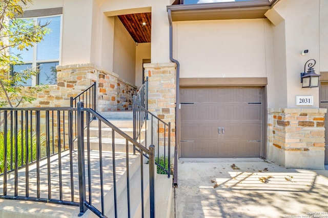 view of gate featuring a garage