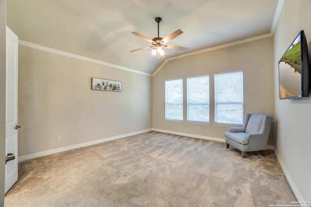 unfurnished room featuring ceiling fan, light colored carpet, lofted ceiling, and ornamental molding