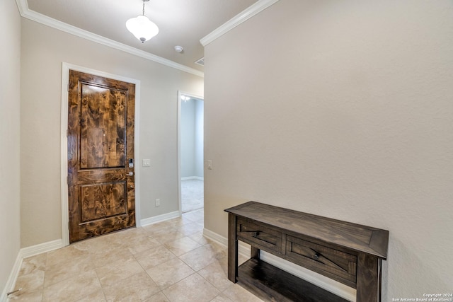 hallway featuring light tile patterned floors and crown molding