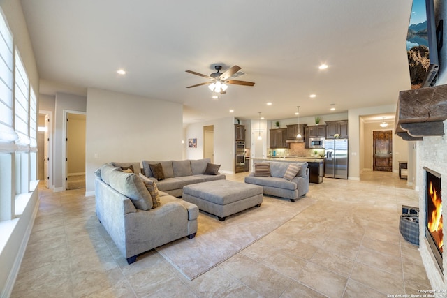 living room featuring ceiling fan