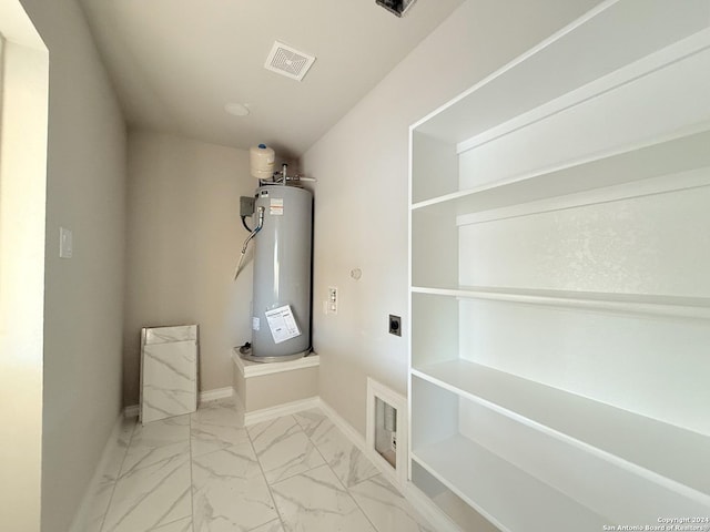 bathroom featuring electric water heater