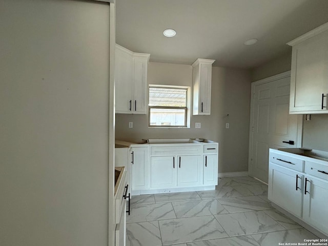 kitchen with white cabinets