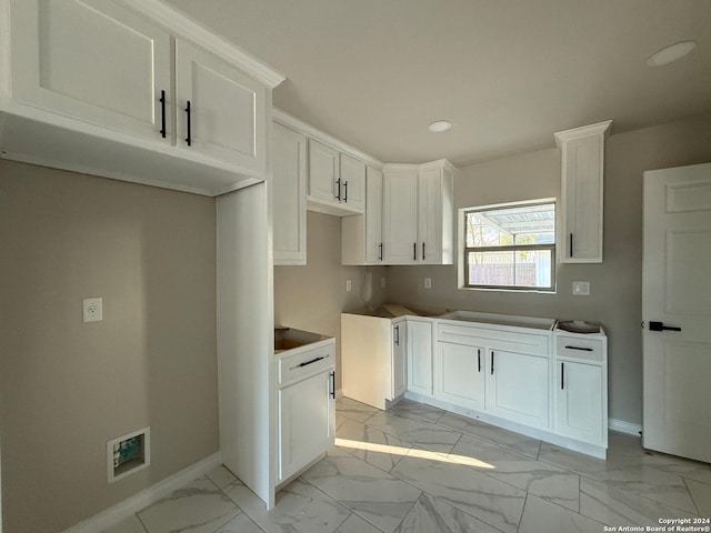 kitchen with white cabinetry