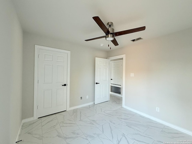 unfurnished bedroom with ceiling fan