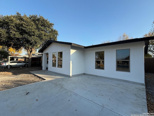 view of front of house with a patio area